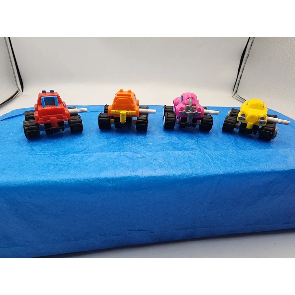 Vintage Style Wind Up Monster Truck Toy Car Lot Red Orange‎ Pink Yellow Set of 4